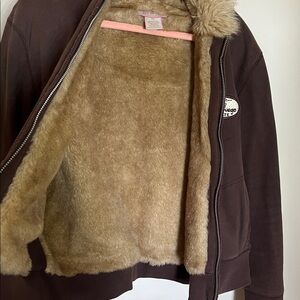 Faux fur MV Sport Brown Jacket w Oswego State logo